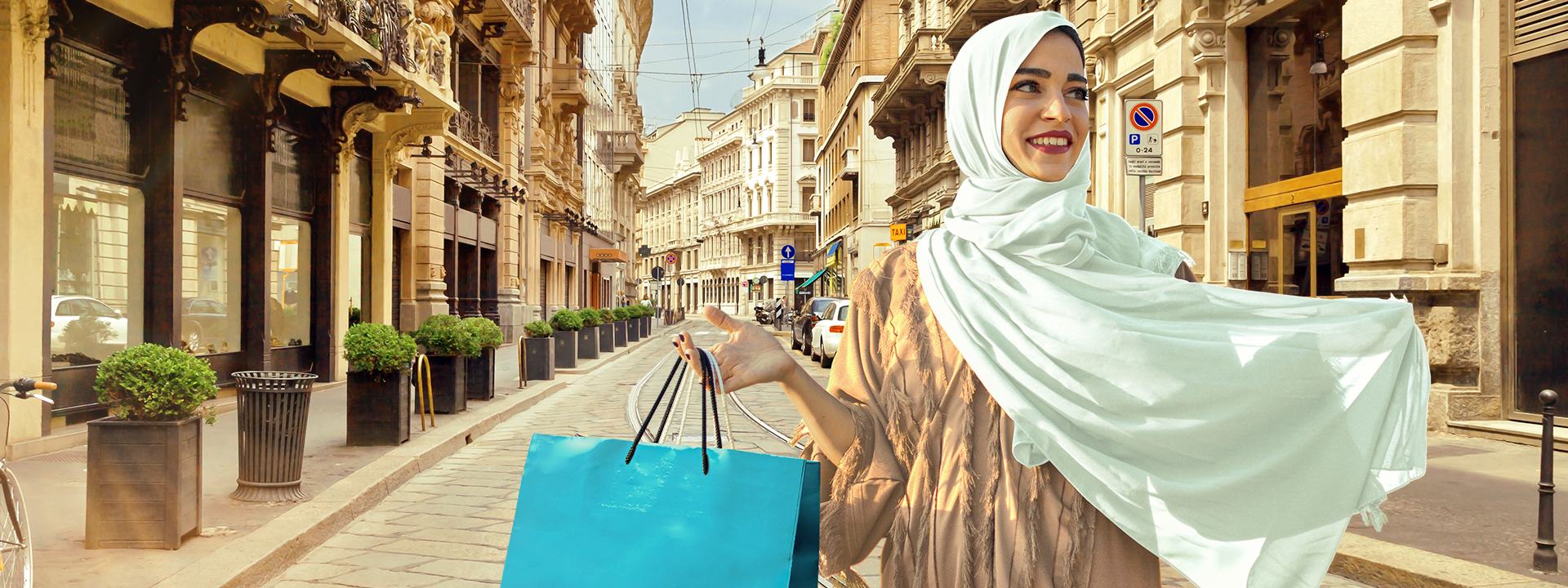 A woman in a sheila with shopping bags