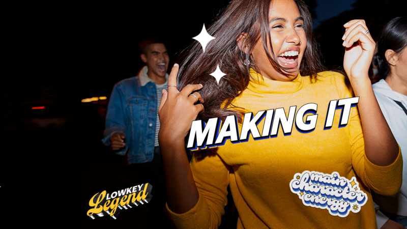 A joyful woman in yellow, with "MAKING IT" text, celebrating with friends at night.